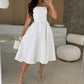 Elegantes, farbloses trägerloses Midi -Kleid