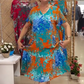 Bedrucktes Damenkleid mit V-Ausschnitt und plissiertem Saum