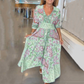 Frauen elegantes Blumenzeichnungen mit langem Kleid
