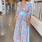 Frauen elegantes Blumenzeichnungen mit langem Kleid